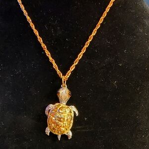 Gold and Silver  Turtle Pendant Necklace With Movable Legs And Head.